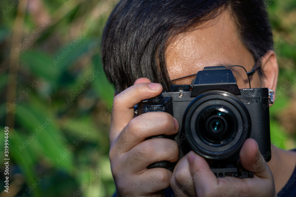 A close up asian man photographer in nature A close up asian man photographer in nature