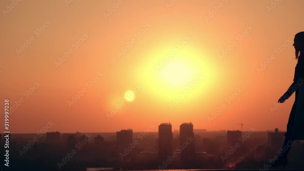 female celebrating success at sunrise in town early morning in urban city slow motion female celebrating success at sunrise in town early morning in urban city slow motion