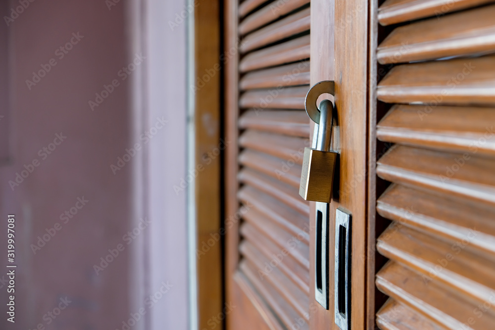 Closeup wooden door lock with copy space Closeup wooden door lock with copy space