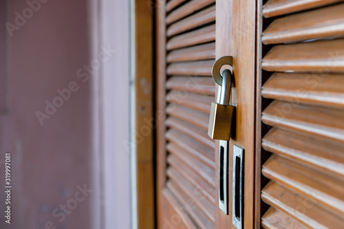 Closeup wooden door lock with copy space