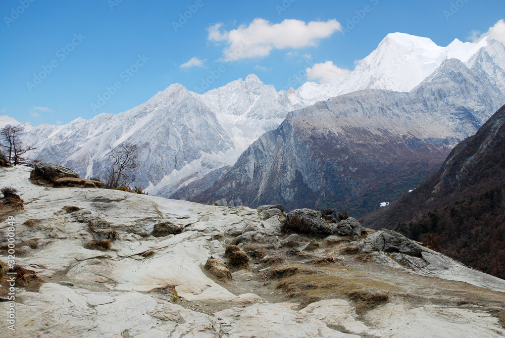 Landscape Nature of Mt.Jambeyang snow mountain in winter season at Yading Nature Reserve china - Blue nature backdrop and beautiful background Travel Hiking Concept in China 