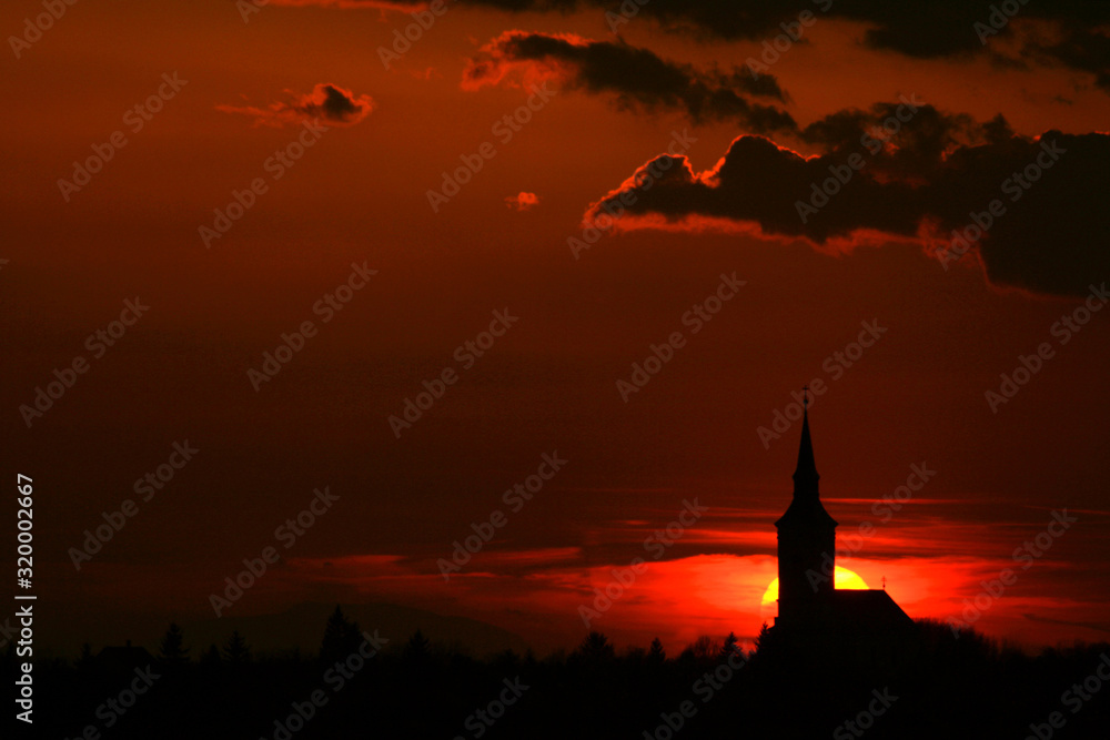 Obraz premium silhouette of the church at sunset