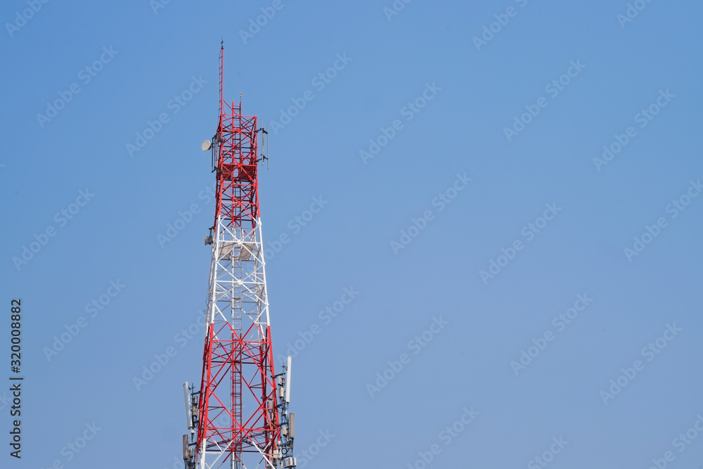 Red signal mobile phone atenna tower and blue sky. Red signal mobile phone atenna tower and blue sky.
