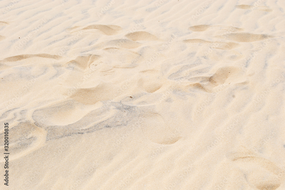 Golden Sand on the beach as background. Sand Texture. Golden sand. Background from fine sand. Golden Sand on the beach as background. Sand Texture. Golden sand. Background from fine sand.
