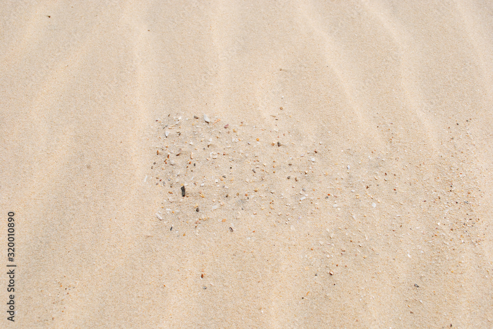 Golden Sand on the beach as background. Sand Texture. Golden sand