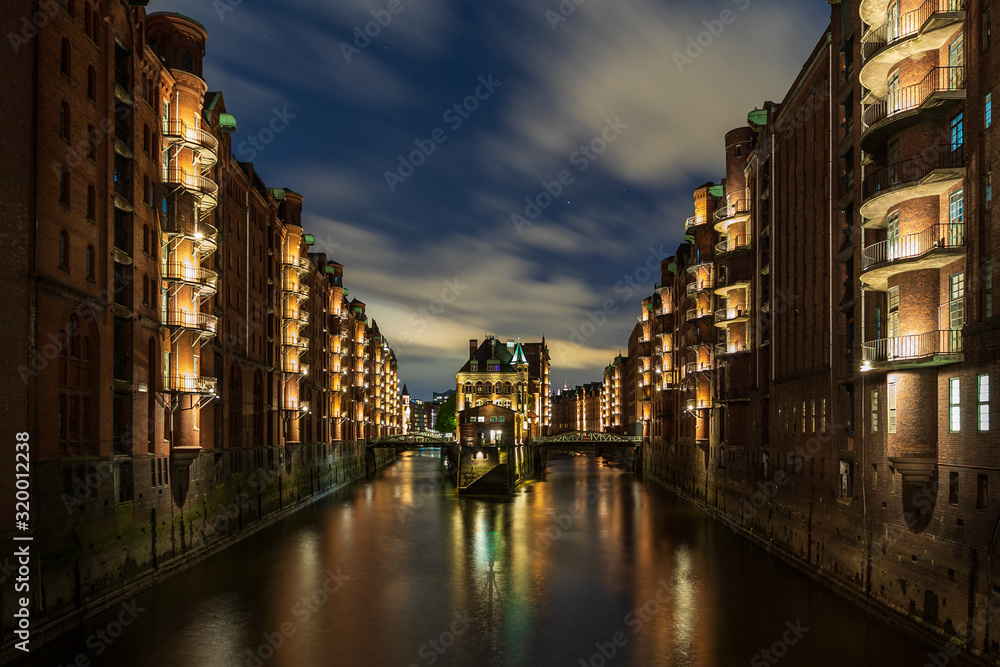The famous Wasserschloss in Hamburg by night, beautiful reflections and lights