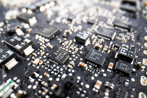 close-up of electronic circuit board with processor, Fragment of the electronic circuit - computer board with chips and components