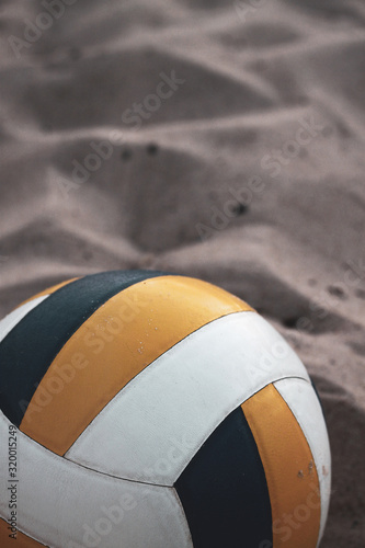 Beach volleyball competition, the ball hit the net, player caught the ball in the net