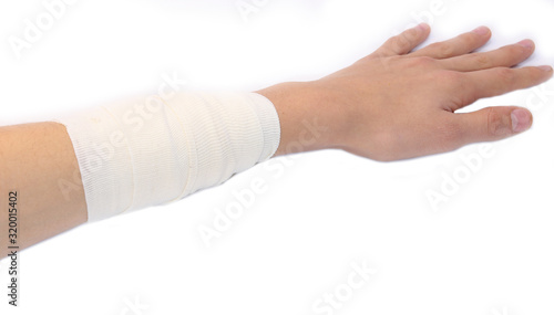 arm bandage of a boy after severe forearm burn photo