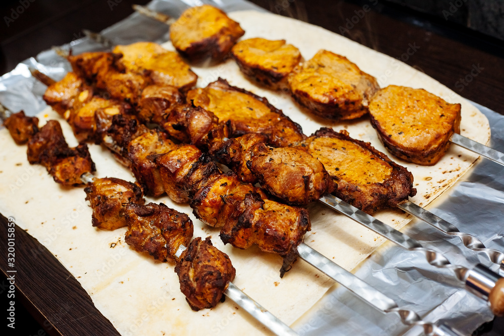 Spiced meat fried in tandoor. Shish kebab. Barbecue.