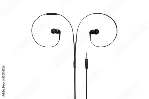 Earphones headset. In-ear headphones. Vacuum wired black headphones for listening music and sound on portable devices on a white background. Ear plugs for music lovers.