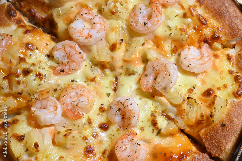 italian pizza cheese with pineapple and shrimp topping sea food