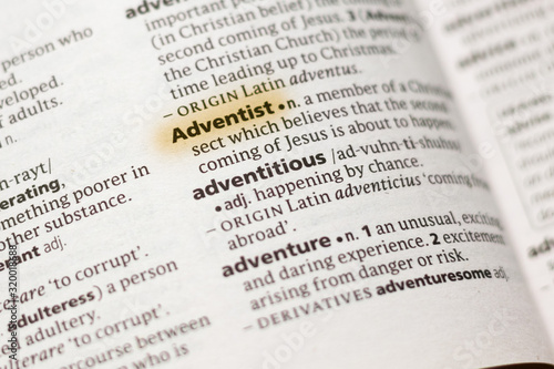 The word or phrase Adventist in a dictionary. photo
