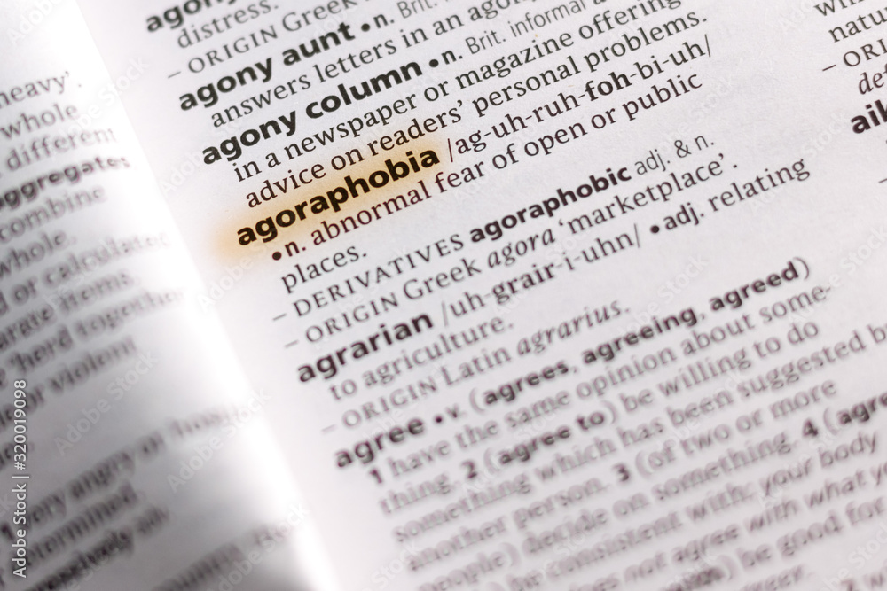 The word or phrase Agoraphobia in a dictionary. The word or phrase Agoraphobia in a dictionary.