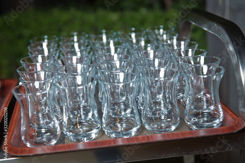 Tea in a armudu glass . armudu tea on tray . Tea in a glass of pears inside the pod . photo