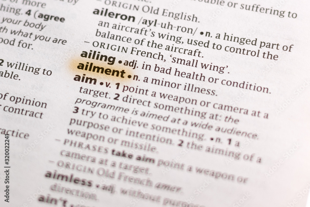 Ivanovsk, Russia - November 19, 2018: The word or phrase Ailment in a dictionary. Ivanovsk, Russia - November 19, 2018: The word or phrase Ailment in a dictionary.