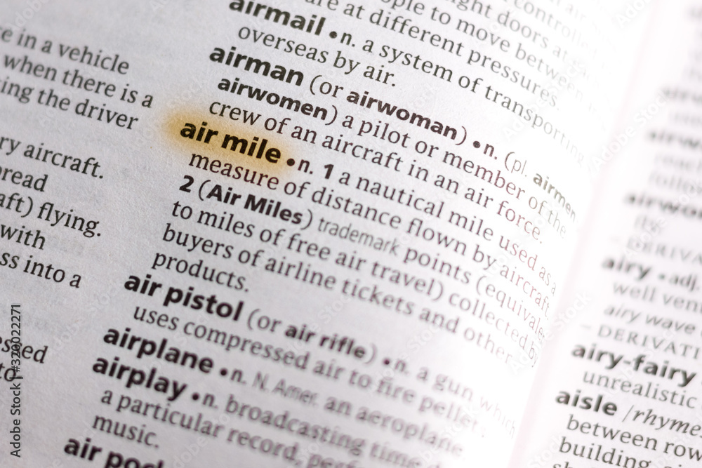Ivanovsk, Russia - November 19, 2018: The word or phrase Air Mile in a dictionary. Ivanovsk, Russia - November 19, 2018: The word or phrase Air Mile in a dictionary.