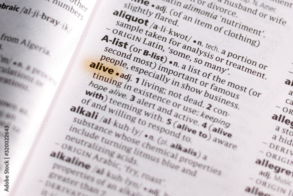 Ivanovsk, Russia - November 19, 2018: The word or phrase Alive in a dictionary. Ivanovsk, Russia - November 19, 2018: The word or phrase Alive in a dictionary.
