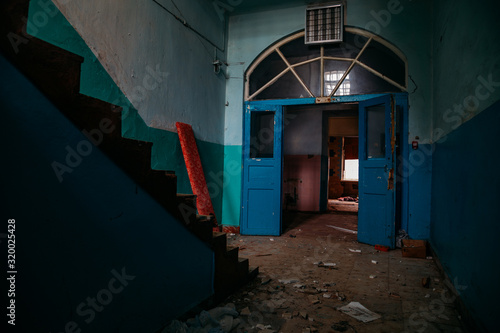 Inside old Orlovka Asylum for the insane in Voronezh Region. Dark creepy abandoned mental hospital photo