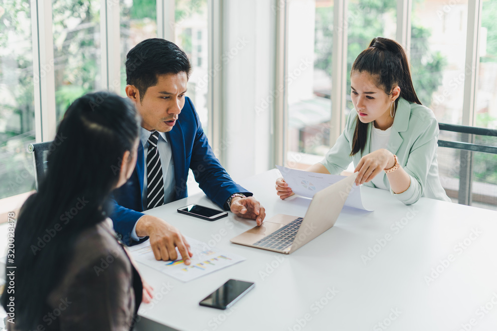 Managers and secretaries meeting and discussing business results from notebooks and paper charging statistics are in the company. Managers and secretaries meeting and discussing business results from notebooks and paper charging statistics are in the company.