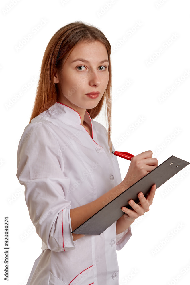 Close-up photo of a woman doctor in a white coat. The doctor monitors the records of the medical history, drugs and the results of the patient's tests. Close-up photo of a woman doctor in a white coat. The doctor monitors the records of the medical history, drugs and the results of the patient's tests.