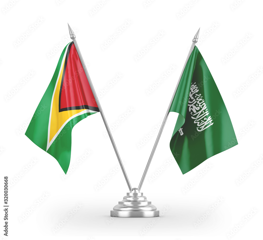 Saudi Arabia and Guyana table flags isolated on white 3D rendering Saudi Arabia and Guyana table flags isolated on white 3D rendering