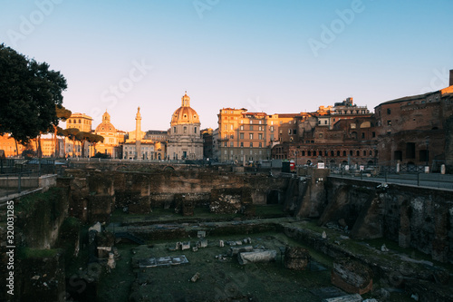 Rome, Italy - Jan 2, 2020: Trajan's Column (UNESCO World Heritage Site) in Trajan's Forum and church of Santa Maria di Loreto, Rome, Lazio, Italy