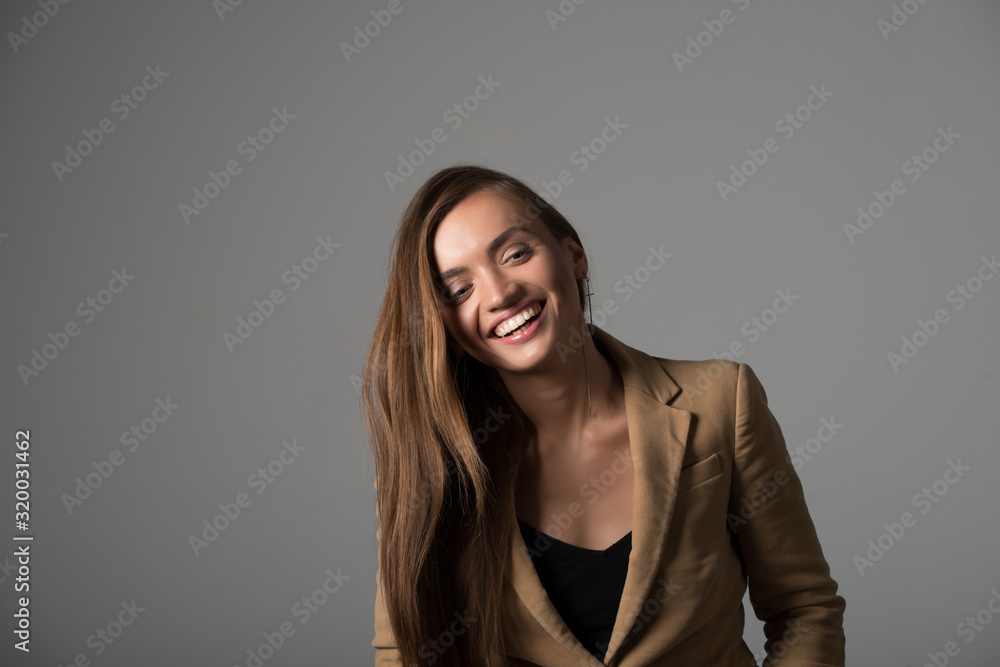 Naklejka premium Portrait of a cute young cheerful girl