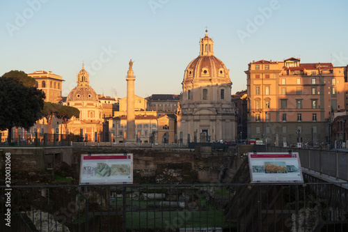 Rome, Italy - Jan 2, 2020: Trajan's Column (UNESCO World Heritage Site) in Trajan's Forum and church of Santa Maria di Loreto, Rome, Lazio, Italy