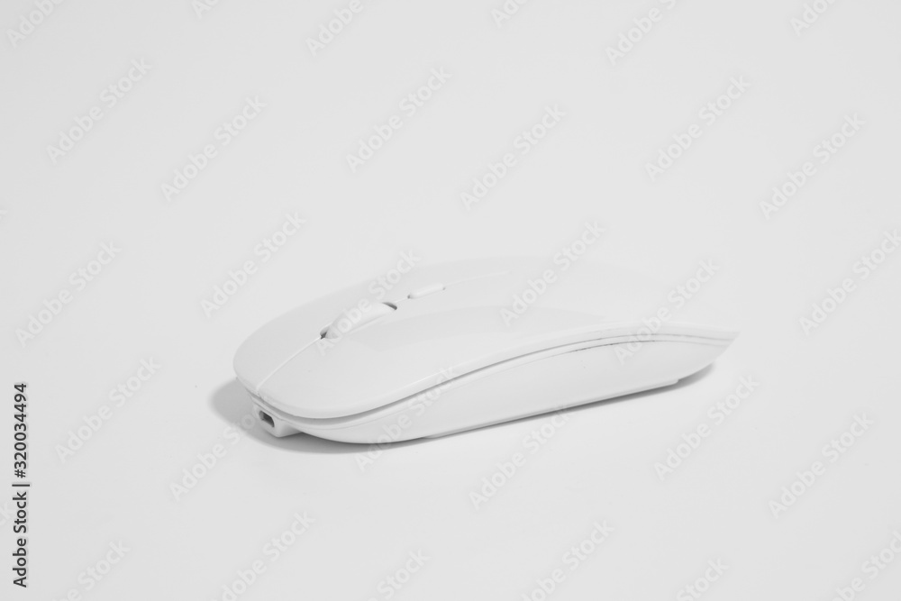 Modern White wireless computer mouse isolated on white background Modern White wireless computer mouse isolated on white background