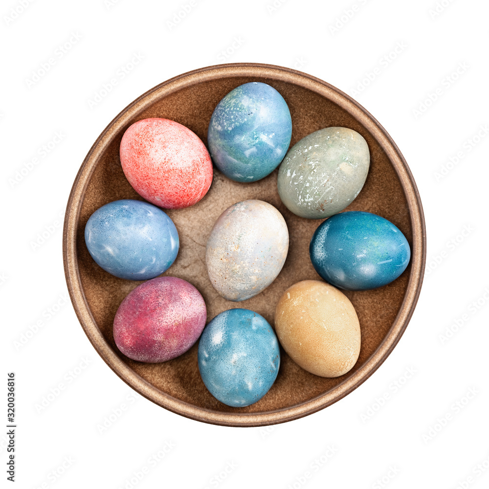 Different easter eggs in ceramic bowl isolated on white Different easter eggs in ceramic bowl isolated on white