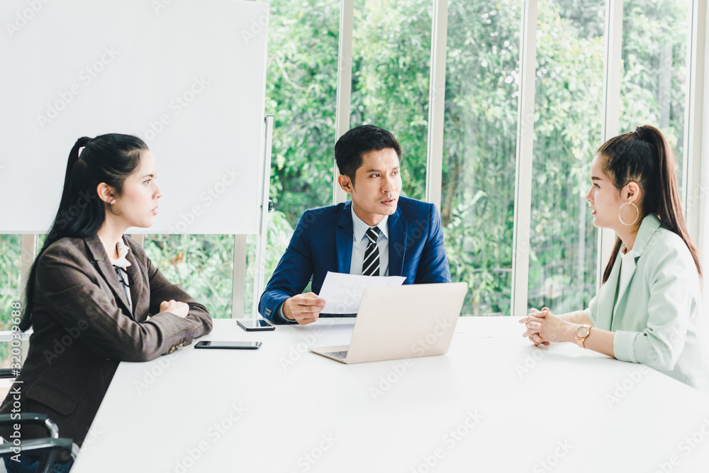 Managers and secretaries meeting and discussing business results from notebooks and paper charging statistics are in the company. Managers and secretaries meeting and discussing business results from notebooks and paper charging statistics are in the company.