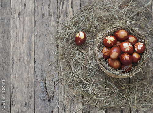 Wallpaper Mural Christ is risen. Onion-painted eggs on dried grass in a nest. Traditional spring festive orthodox food. Easter Sunday. Torontodigital.ca