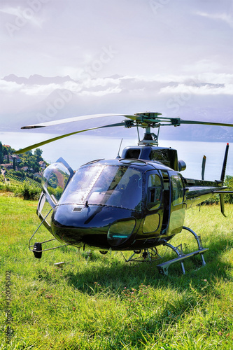 Helicopter at Lavaux, Lavaux-Oron district of Switzerland. Geneva Lake on the background