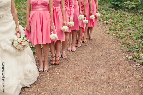 Bride and bridesmaids are waiting for the start of the wedding ceremony