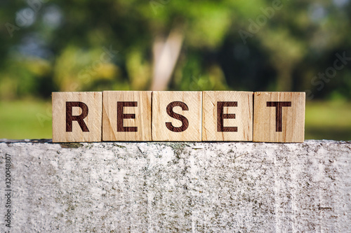 Wooden Block With The Word Reset