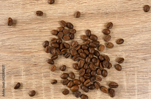 coffee grains on wooden boards © andreysafonov