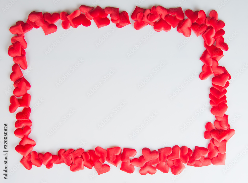 Silk hearts on a white background in a frame Silk hearts on a white background in a frame