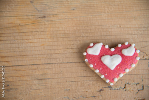 heart shaped gingerbread on a wooden table