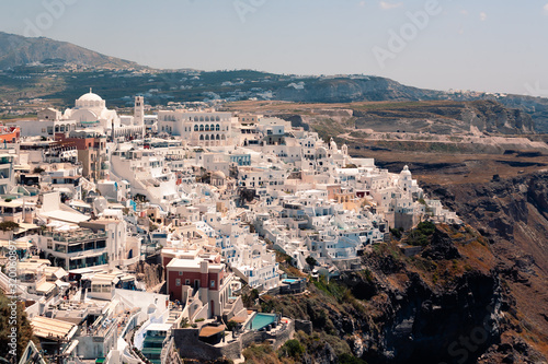 Classical view on the decoration and architecture of Thera Fira village Santorini at sun weather