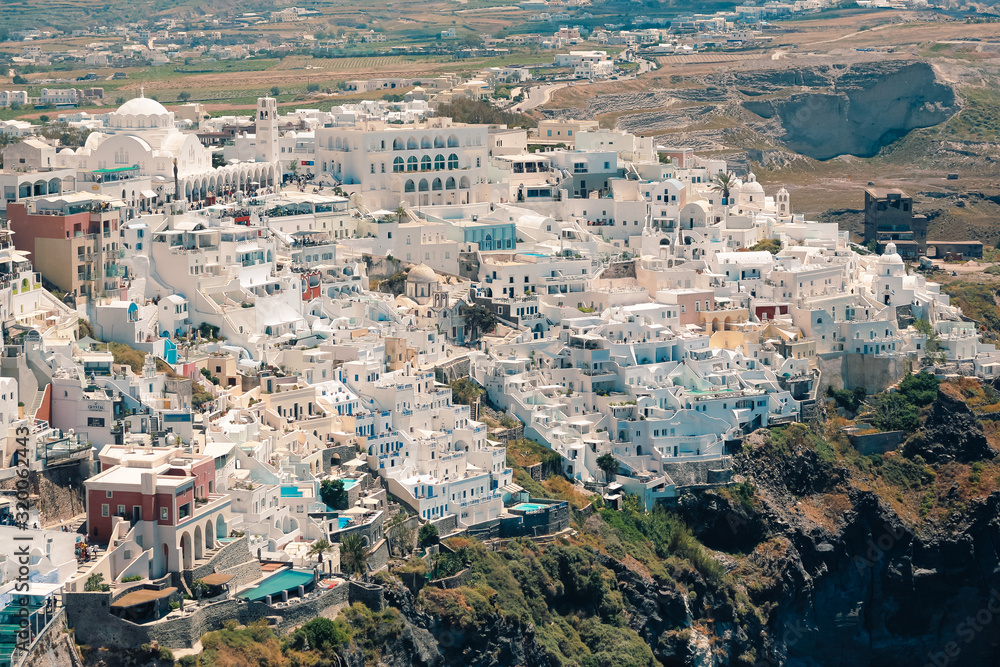 Classical view on the decoration and architecture of Thera Fira village Santorini at sun weather