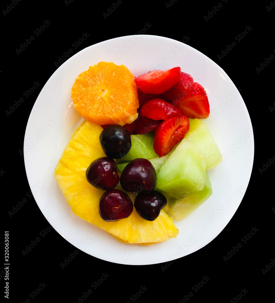 plate of healthy fruit, pineapple, water melon, strawberries, orange and cherries