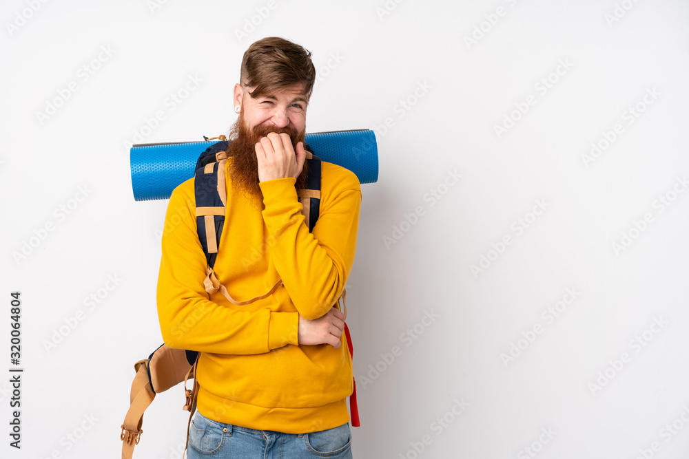 Young mountaineer man with a big backpack over isolated white background nervous and scared Young mountaineer man with a big backpack over isolated white background nervous and scared