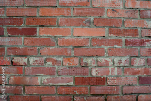 The texture of the walls of red brick. brickwork, building.