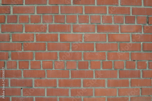 The texture of the brickwork of red brick. Structure, architecture.