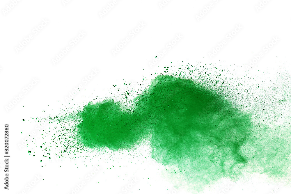 Green powder explosion on white background. Green powder explosion on white background.
