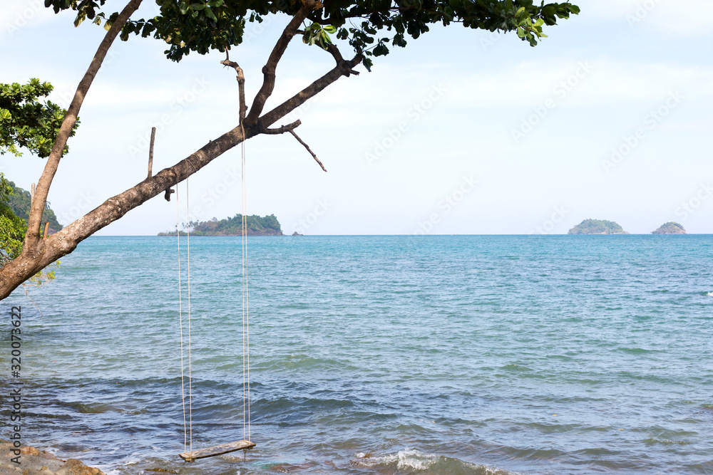 Green leaves on blue sea waves summer background. Green leaves on blue sea waves summer background.