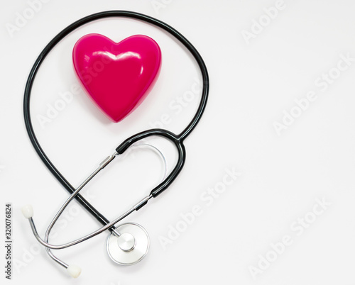 Stethoscope for measuring blood pressure on a white background, heart