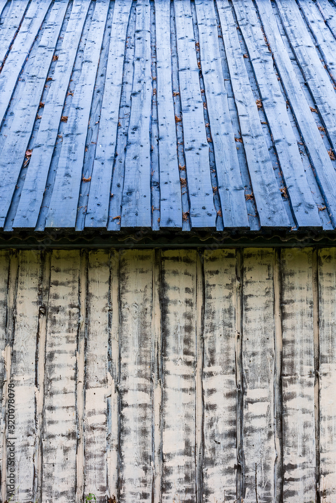 wooden building with vertical plank wall cladding wooden building with vertical plank wall cladding