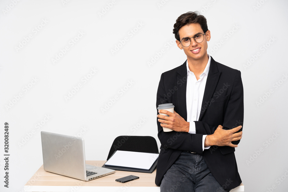 Businessman in his office over isolated white background laughing Businessman in his office over isolated white background laughing
